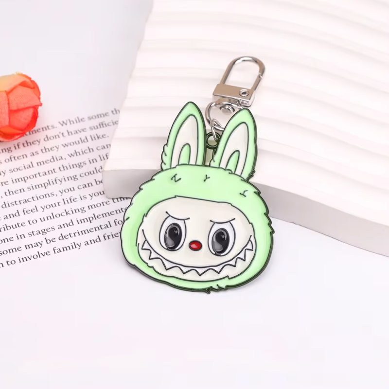 Labubu Lazo de 9 dientes de monstruo con forma de figura de anime, lazo con colgante esmaltado de aleación a la moda, joyería, llave hermosa, accesorios para bolso - Image 2